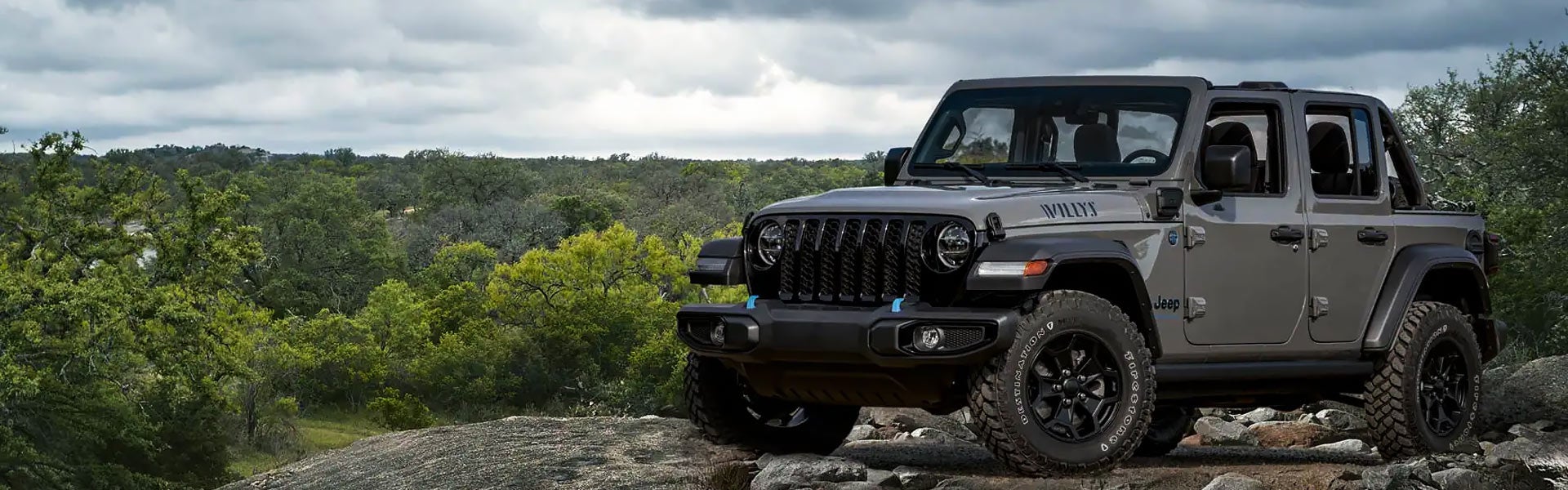 2023 Jeep Wrangler parked on rocky mountain